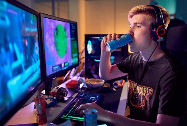gamer taking break and relaxing while drinking 