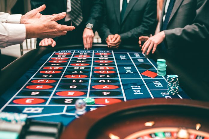 Players playing a gambling game in a casino