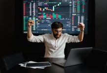 A man excited after making profits in trading.