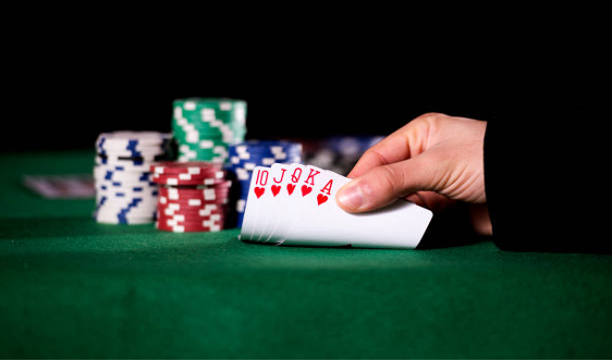 Man playing poker with cards.