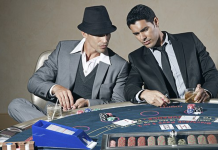 Players gambling with cards.