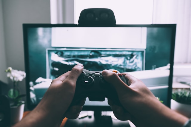 A boy playing video games.