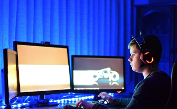 A boy playing video game.